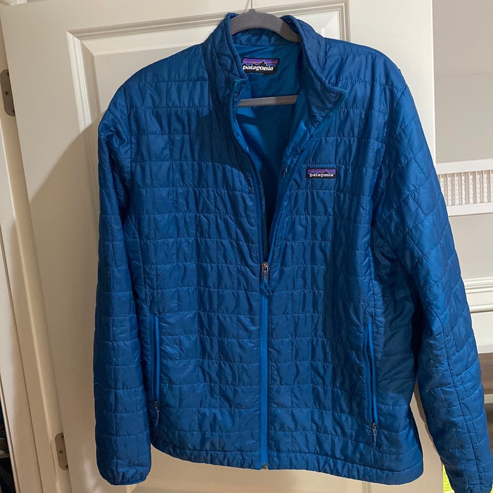 Patagonia blue light weight puffer jacket, no size tag. Large